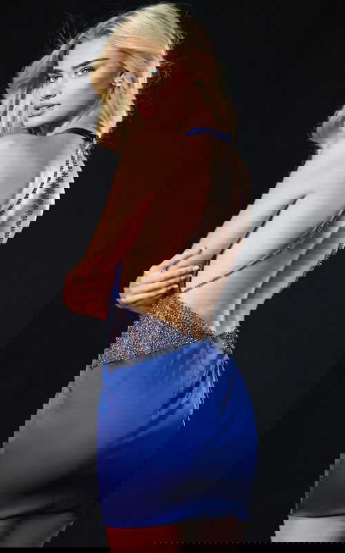 Elegant satin dress featuring plunging neckline and sparkly waist detail