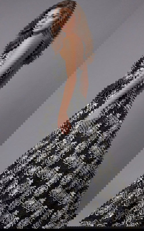 Front view of a strapless floral evening gown with a fitted bodice and full skirt