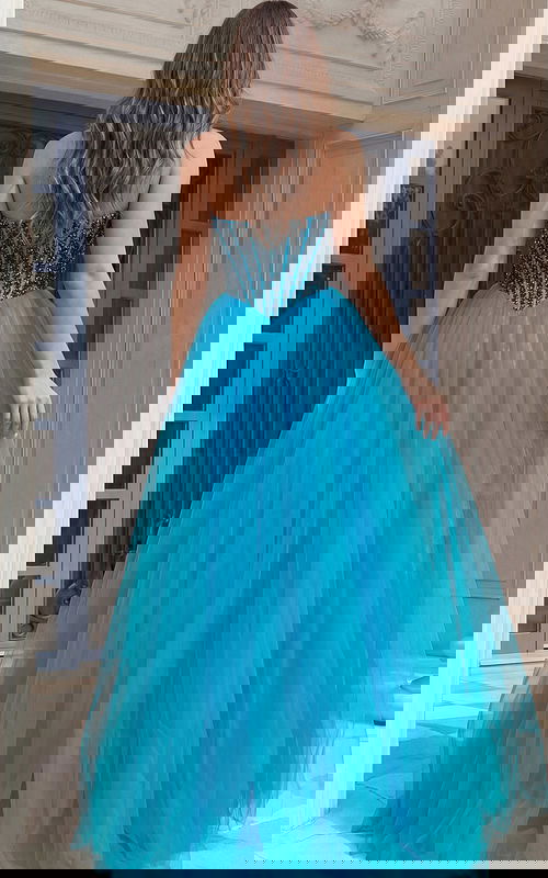 back of blue embellished prom dress 45539