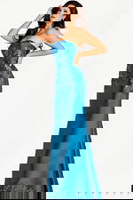 Strapless teal gown with a metallic floral jacquard bodice and smooth satin skirt, paired with dramatic off-shoulder draped sleeves for a refined and luxurious look.