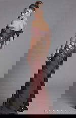 Back view of off shoulder fitted gown with structured puff sleeves and metallic floral bodice