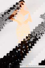 Elegant black gown with gold embroidered floral appliqué and sheer skirt.