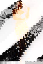 Black formal dress adorned with golden leaf patterns and semi-sheer panels.