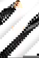 Sophisticated black gown featuring shimmering sequins and sculpted silhouette.