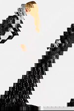 Black sequin gown with structured collar and long sleeves