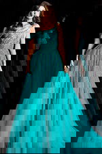 Elegant beaded ball gown with draped shoulder strap and full tulle skirt