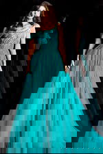 Elegant beaded ball gown with draped shoulder strap and full tulle skirt