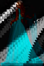 One shoulder tulle gown with shimmering bead lines and flowing skirt