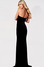 Elegant formal gown with double bow embellishment and open back