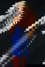 Back view of satin mini dress with smooth tailored finish