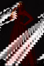 Elegant blush satin dress featuring structured bodice and layered high low hem