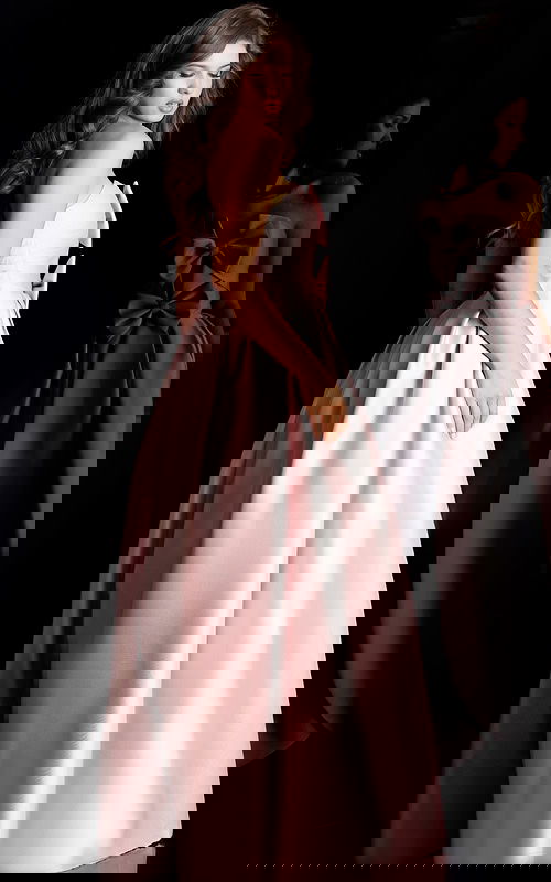 Strapless satin ball gown with cascading front bows and full pleated skirt