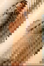 Sparkling tiered mini dress with mesh layers and fitted bodice