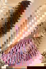 Fit-and-flare prom dress with floral center and spaghetti straps