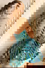 Sculpted Emerald Mini Dress With Iridescent Shine