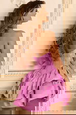 Lilac mini dress with sculpted bodice and ruffled hem