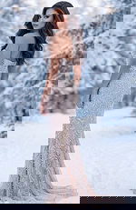 Back view of beaded illusion column evening gown with fitted silhouette