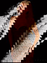 Elegant sweetheart neckline dress featuring intricate pearl detailing and sheer overlay