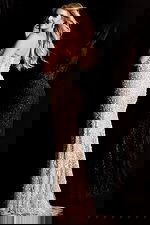 Strapless beaded gown with pearl and sequin embellishments in a fitted silhouette