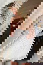 Back view of mini dress with structured mesh and crystal embellishments