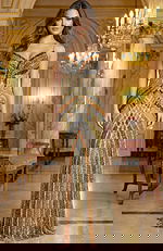 Beaded illusion column gown with spaghetti straps and fitted silhouette