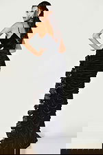 Elegant velvet dress featuring rhinestone straps and floral side slit