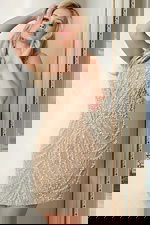 Sleeveless mini dress with sheer mesh and pearl beaded pattern