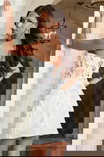 Short sheer corset dress featuring 3D flower appliqués