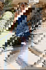 Strapless light blue gown with floral applique and sheer dotted skirt