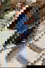 Blue embroidered formal dress with sheer dotted mesh and floral accents