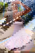 Short party dress with ruffled hem and organza detail