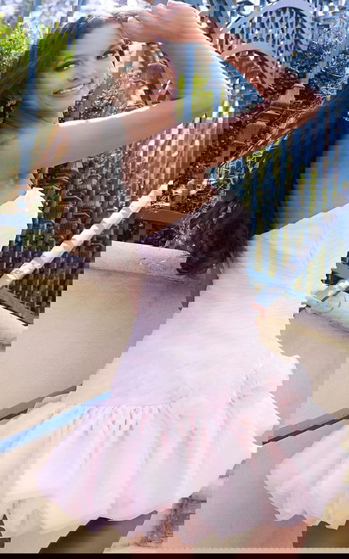 Short party dress with ruffled hem and organza detail