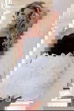 Strapless black satin dress with white rosette skirt