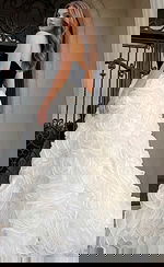 Elegant strapless gown featuring contrast bodice and statement floral skirt