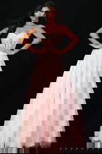 Front view of strapless beaded gown with corset bodice and tulle skirt