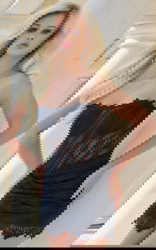 Strapless lace mini dress with sheer boned bodice