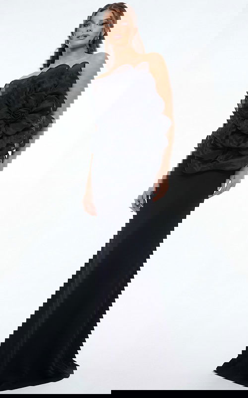 Strapless black evening gown with sculpted floral bodice and fitted straight skirt shown from the front