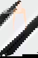 Back view of black strapless evening dress with smooth fitted silhouette and floor length hem