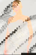 Close-up of floral organza detail on strapless jumpsuit