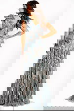 Elegant grey ball gown with layered embellishments and flowing skirt