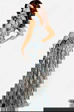 Grey sequin gown with flutter sleeves and deep V-neckline