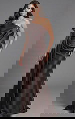 One shoulder satin gown with draped knot detail and fitted silhouette