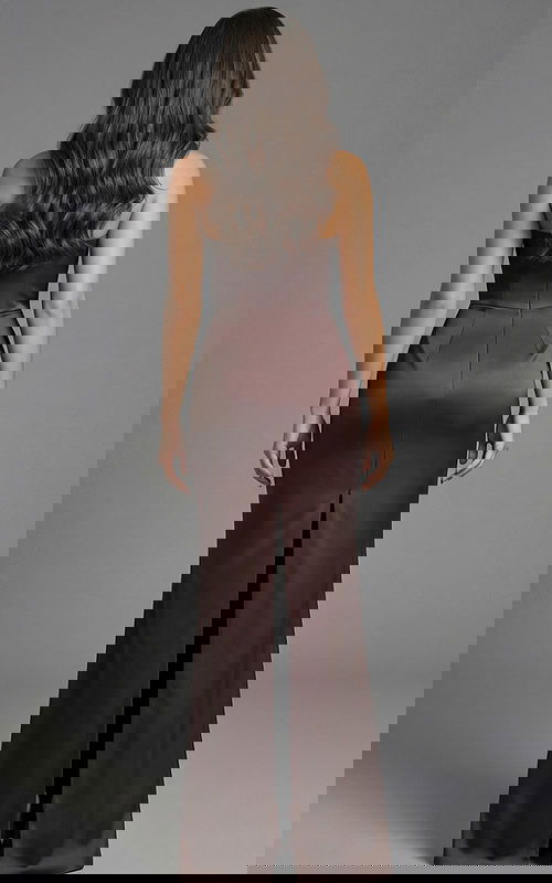 Back view of sleek evening gown with smooth satin finish and center slit