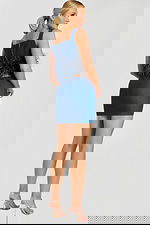 Side View of Denim Feather Crop Top and Pocketed Mini Skirt Set