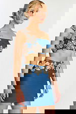 Blue denim crop top and skirt set with beaded flower embellishments