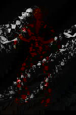 Sequin floral jumpsuit with deep neckline and wide-leg fit