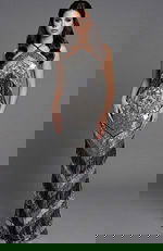 fitted beaded gown highlighting the halter neckline and vertical fringe pattern