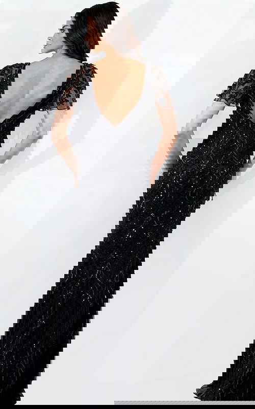 Elegant gown with intricate beadwork and soft flutter sleeves