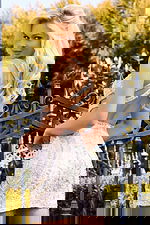 Back view of glittering bodycon dress with low cut design