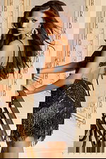 Sparkly cocktail dress with strappy back and shimmering beading